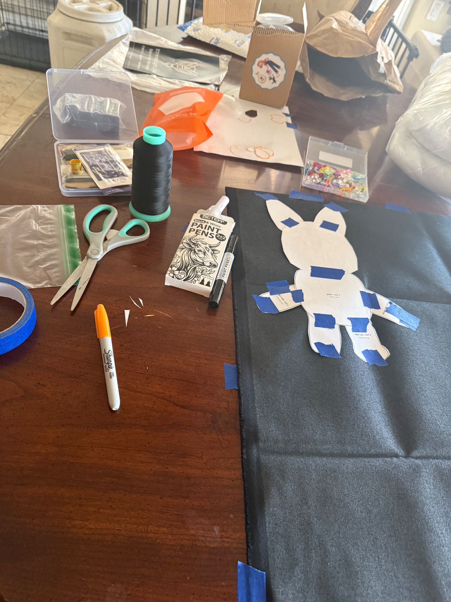 Pattern taped onto the 1000D nylon, ready to cut.
